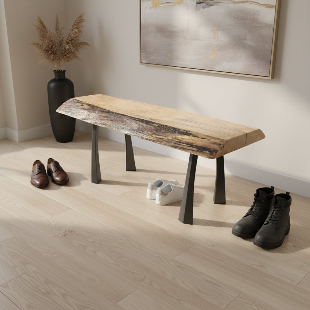 Wooden bench with black legs on a textured red background